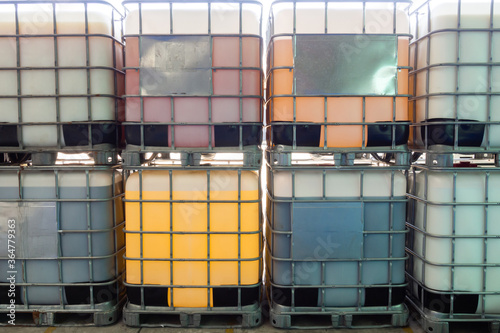 Plastic container with steel or aluminum mesh structure as a pallet for various chemicals.