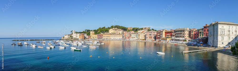 Panoramic aerial view of the Bay of Silence in Sestri Levante with many colored houses