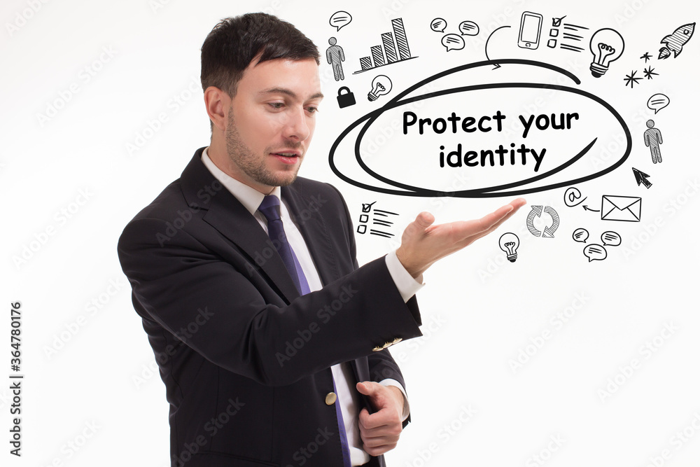 Business, technology, internet and network concept. Young businessman thinks over the steps for successful growth: Protect your identity Business, technology, internet and network concept. Young businessman thinks over the steps for successful growth: Protect your identity