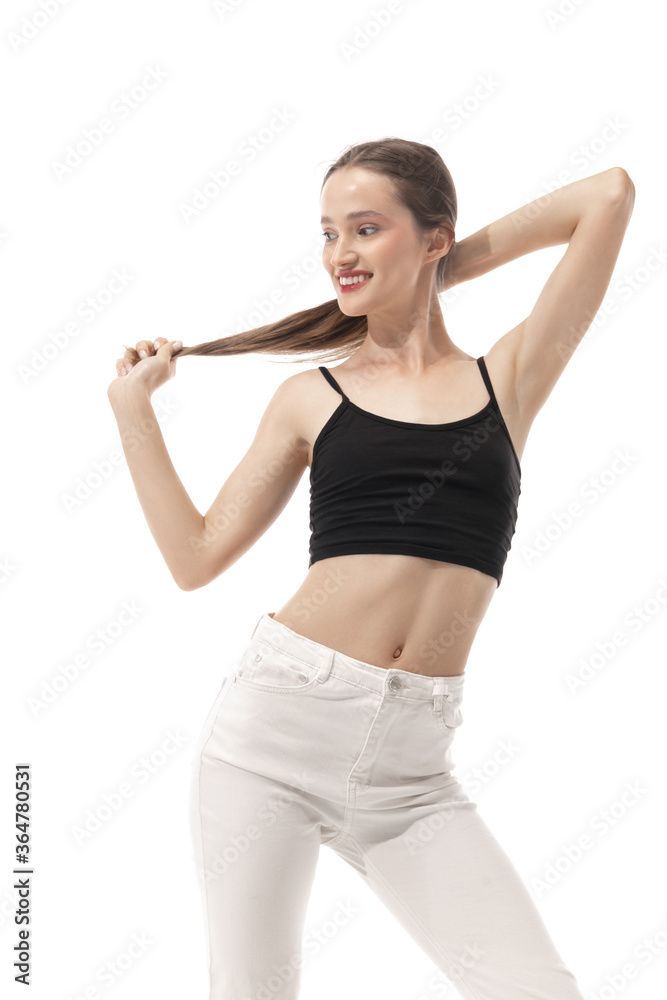 Portrait of beautiful young woman isolated on white studio background. Concept of beauty, skin care, fashion and style. Artwork, modern and trendy portrait. Attractive model in black and white casual. Portrait of beautiful young woman isolated on white studio background. Concept of beauty, skin care, fashion and style. Artwork, modern and trendy portrait. Attractive model in black and white casual.