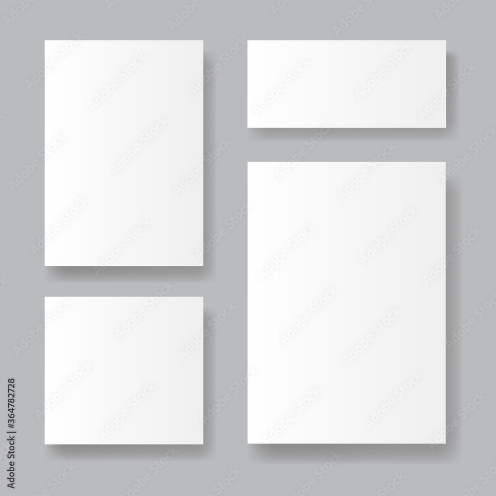 Set of realistic paper sheets on grey background with soft shadows. White booklet template. Business card design or flyer mock-up. Vector illustration. Set of realistic paper sheets on grey background with soft shadows. White booklet template. Business card design or flyer mock-up. Vector illustration.