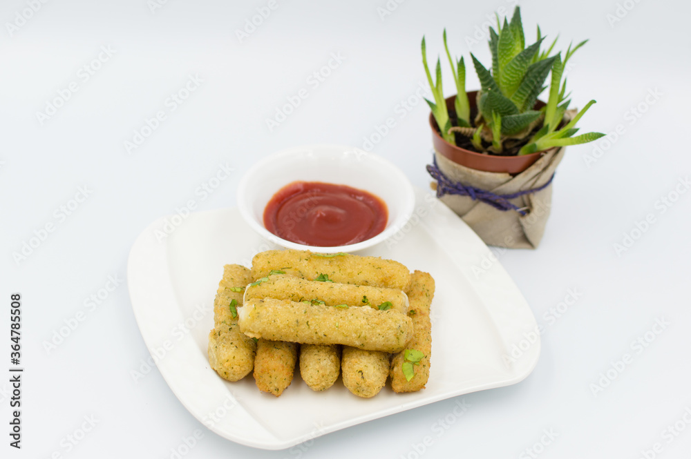 fried Mozzarella sticks with ketchup on the side. Italian starter. 