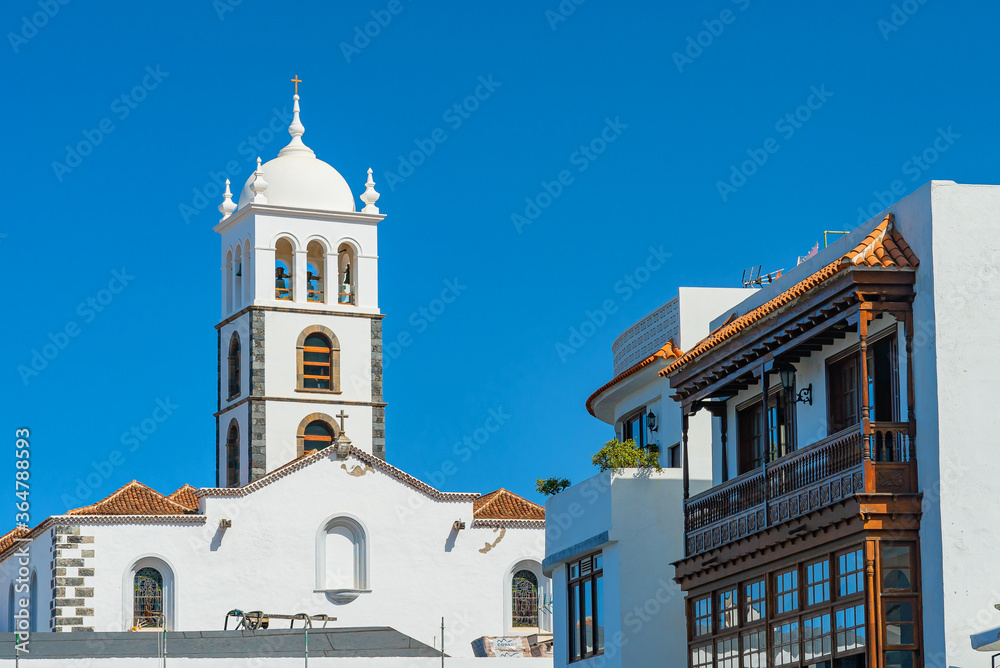 Old church Ex-Convento de San Francisco in Garachico and authentic wooden balconies, Tenerife, Spain.