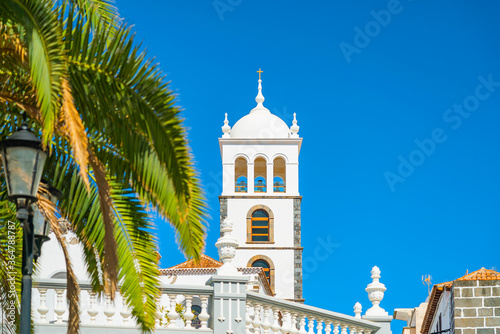 Old church Ex-Convento de San Francisco in Garachico and palm leaves  Tenerife  Spain.