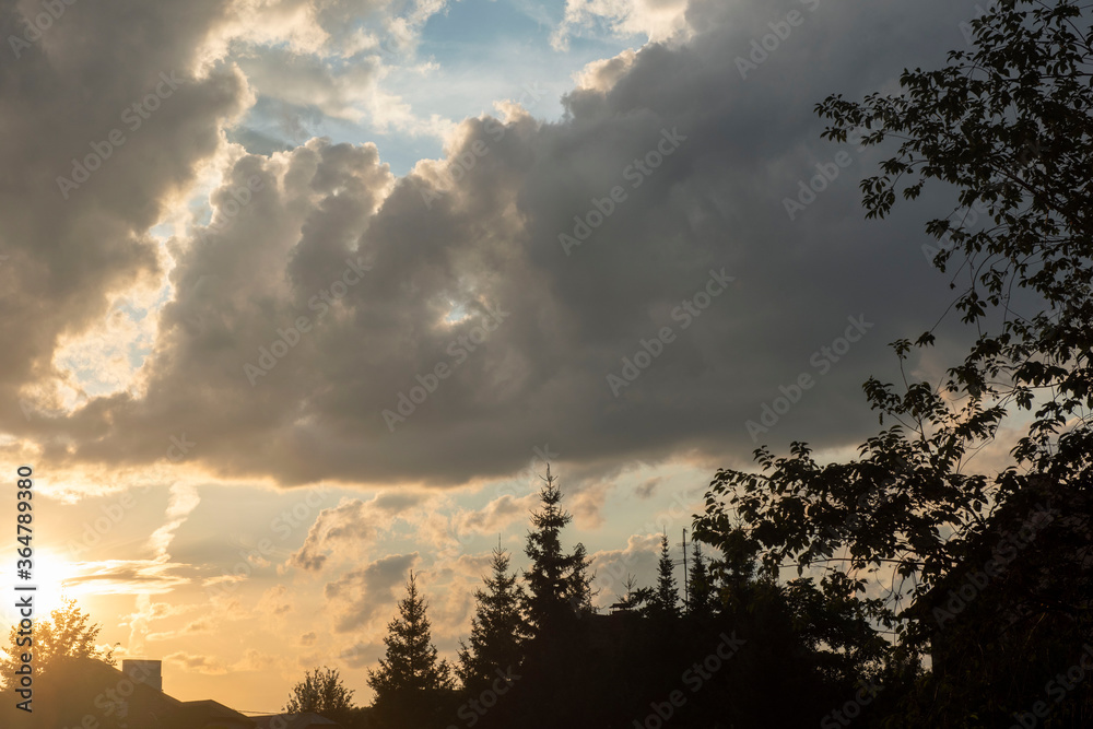 dark cumulus clouds white window among the dark sky