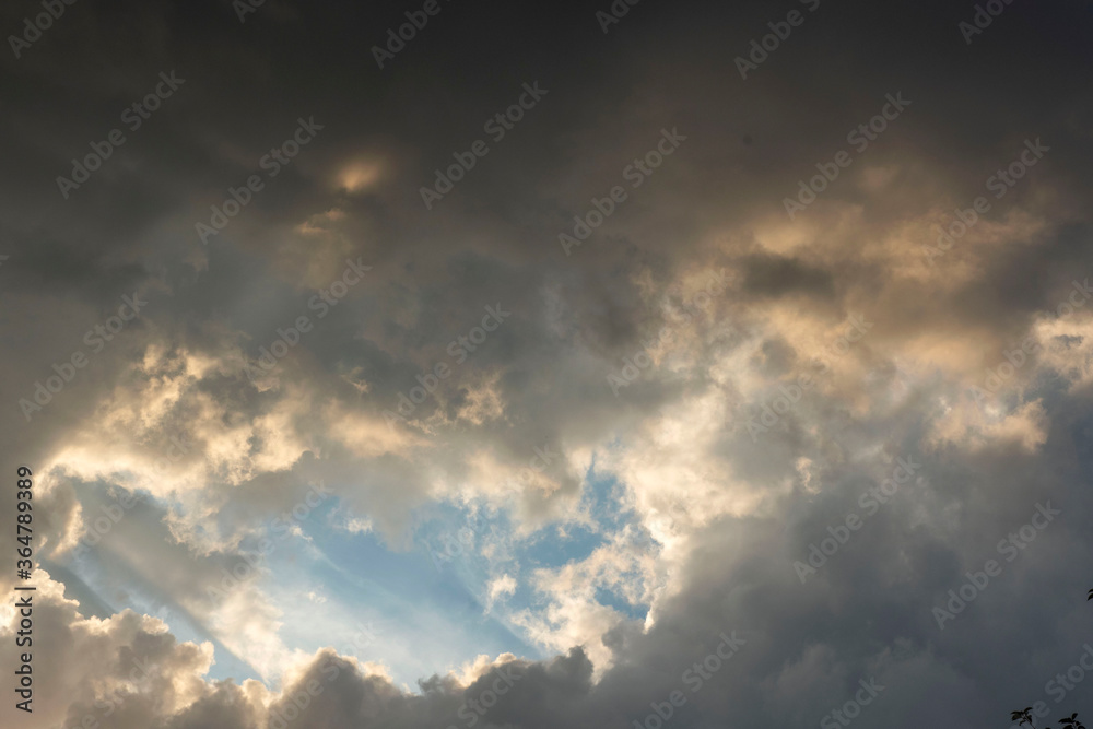 dark cumulus clouds white window among the dark sky dark cumulus clouds white window among the dark sky