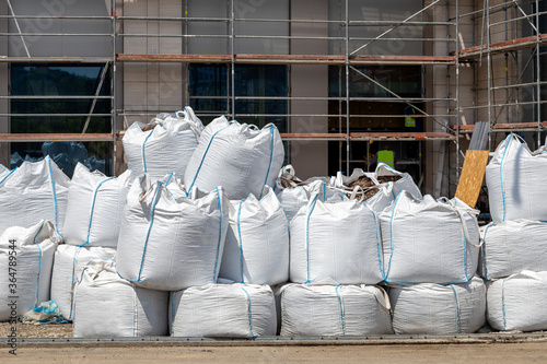 Sacks with construction waste on the street