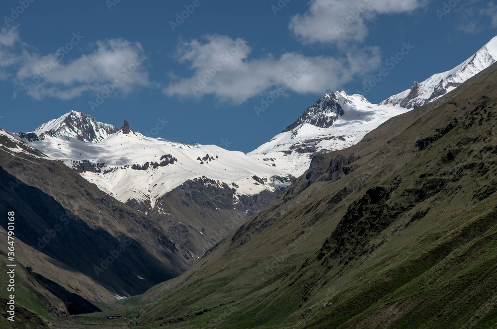 Caucasus mountains in Georgia. Truso Valley. Mount Kazbek 5037 meters. Summer 2020, June. Travel to Georgia