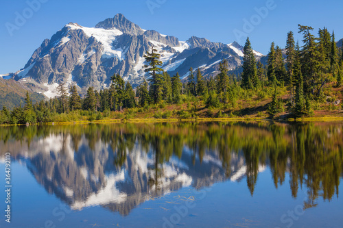 Mt. Shuksan and reflections in Picture Lake in autumn in Washington state