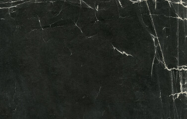 photo texture of old paper in black hue