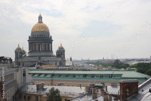 Saint-Petersburg, Russia - 10.06.20. Cityscape panorama of old central city part, view from a roof. Famous rooftops of St. Petersburg with Saint Isaac's Cathedralat the background. © Светлана Кокорина