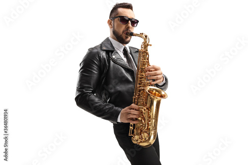 Canvas Print Guy in a leather jacket playing a sax