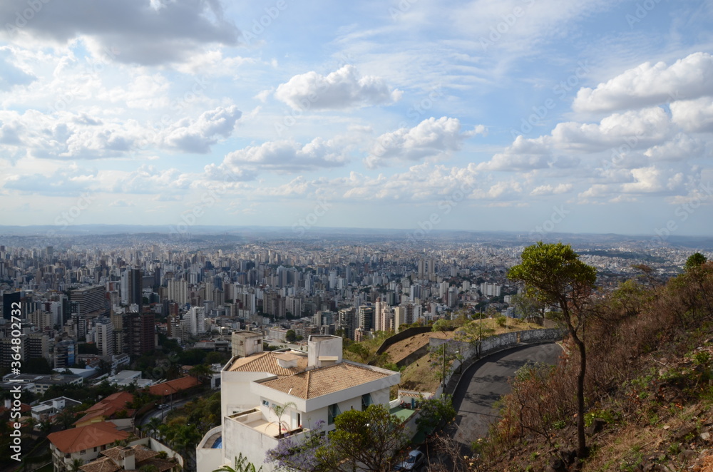 Obraz premium Landscape of the city of Belo Horizonte, State of Minas Gerais, Brazil at a sunny day with blue sky at 3pm in the spring