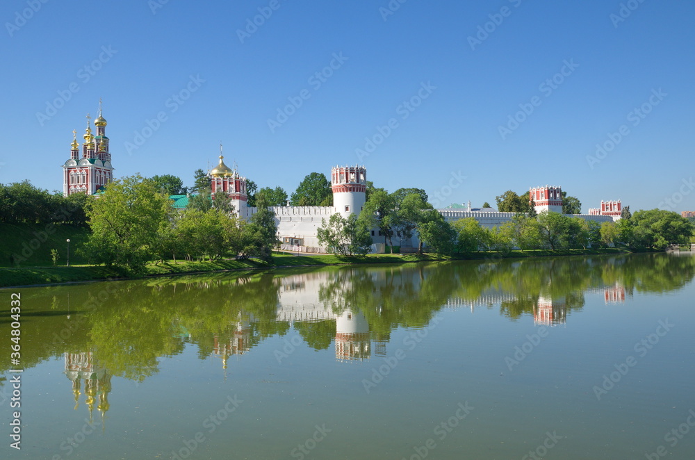 Summer view of the Novodevichy monastery and the Big Novodevichy pond. Moscow, Russia