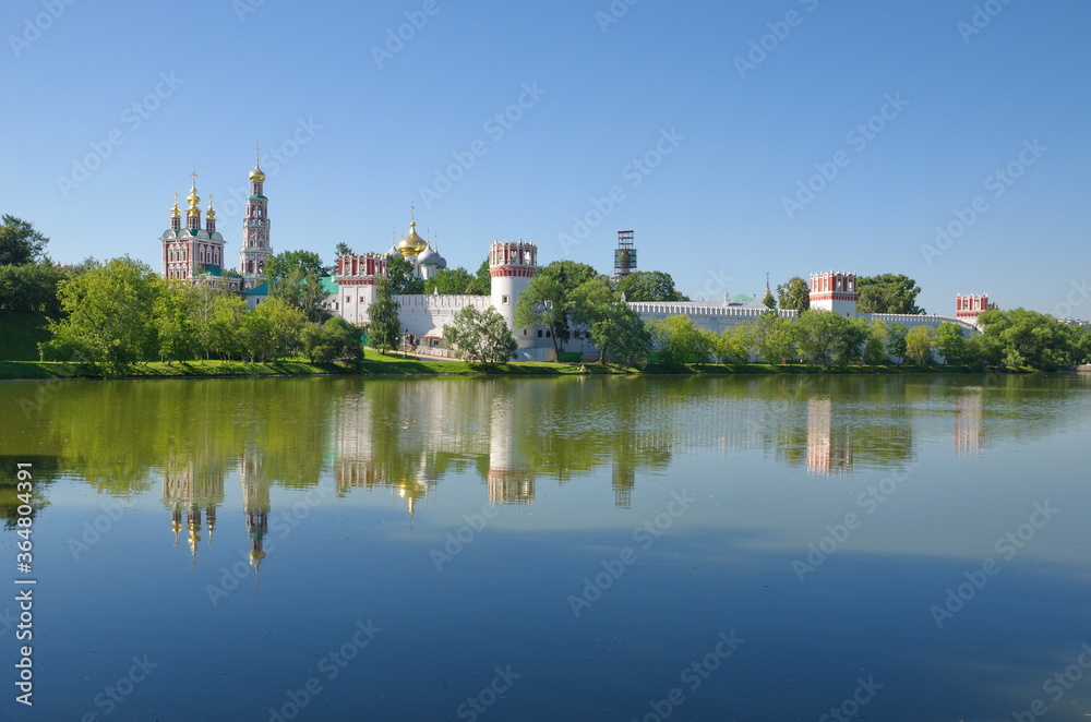 Summer view of the Novodevichy monastery from the Big Novodevichy pond. Moscow, Russia