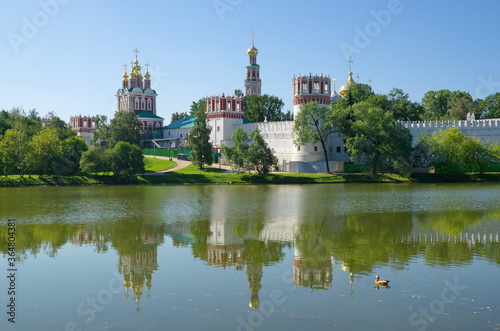 View of the Novodevichy monastery and the Big Novodevichy pond on a Sunny summer day. Moscow, Russia