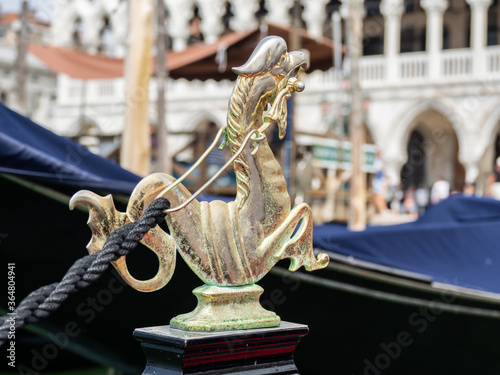 Venice, Italy. Gondola, the famous and traditional flat bottomed Venetian rowing boat. Details of the ornaments that adorn the gondola