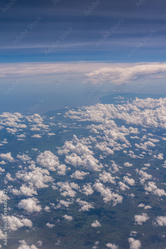 Fototapeta premium Clouds in airplane window
