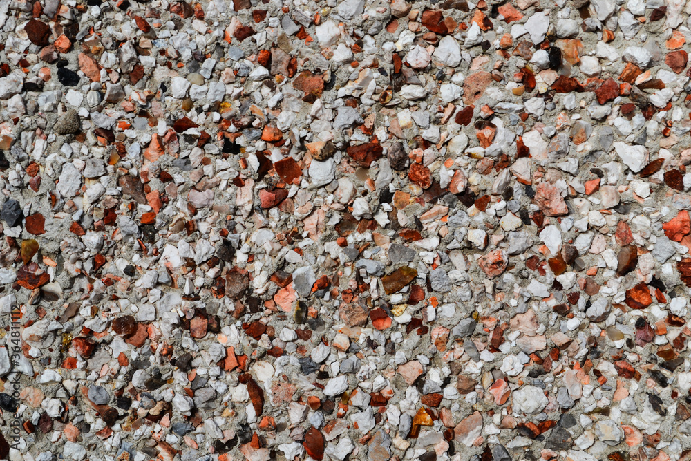 Close up shot of a pebble wall texture Close up shot of a pebble wall texture