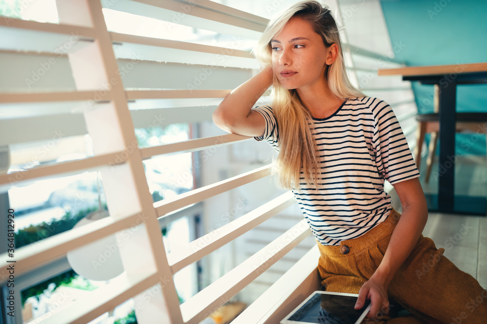 Portrait of a beautiful young blonde woman