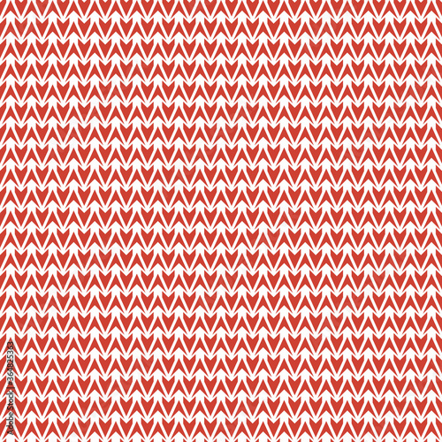 Red and white knit texture seamless vector pattern. Christmas sweater seamless vector pattern for fabrics, textiles, stationery, winter time gift wrap, home decor and packaging.
