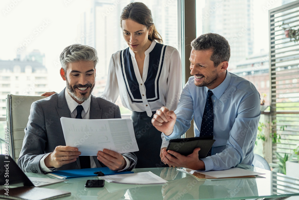 Smiling business people working in office Smiling business people working in office
