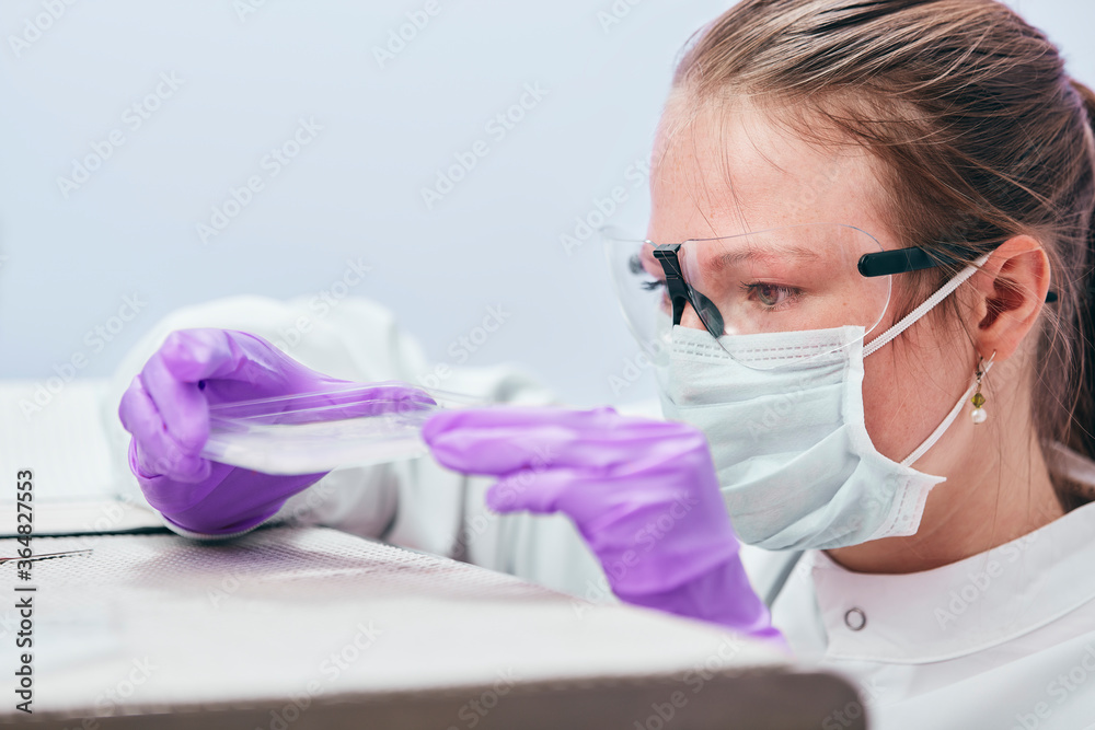 Female technician working in laboratory Female technician working in laboratory