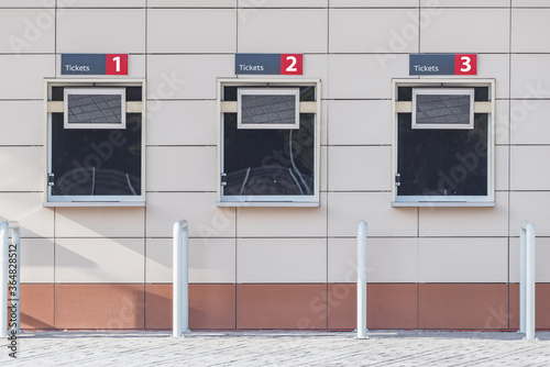 Three windows of the stadium ticket offices.