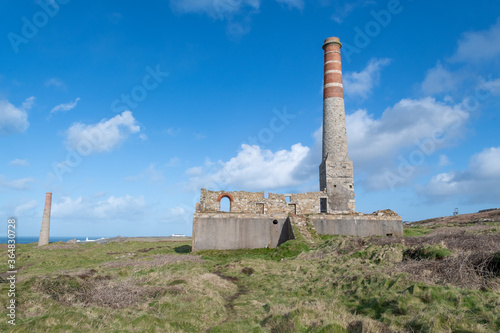 Landscape photo of an abandoned building from the mining industry on the Cornish caost photo