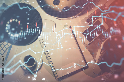 Multi exposure of forex chart drawing and work table top veiw. Concept of financial analysis.