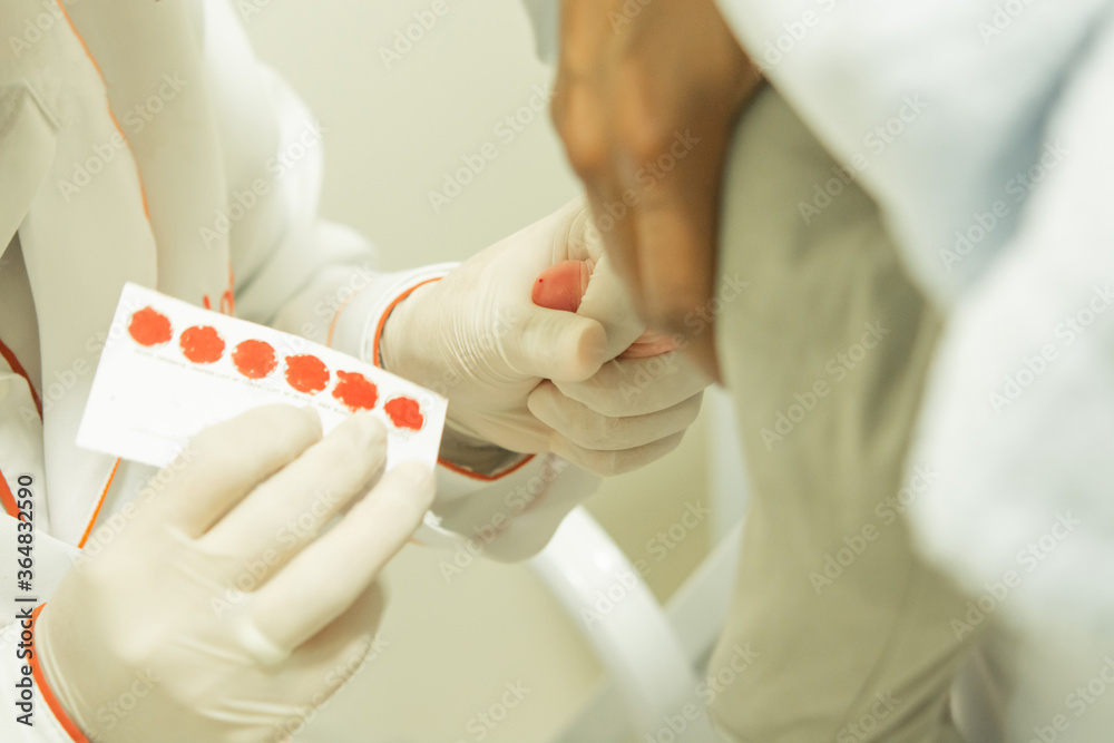 closeup of examining foot in newborn, (foot test) closeup of examining foot in newborn, (foot test)