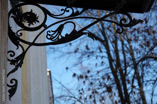 Elaborate metal latticework at historical house entrance, Russia photo