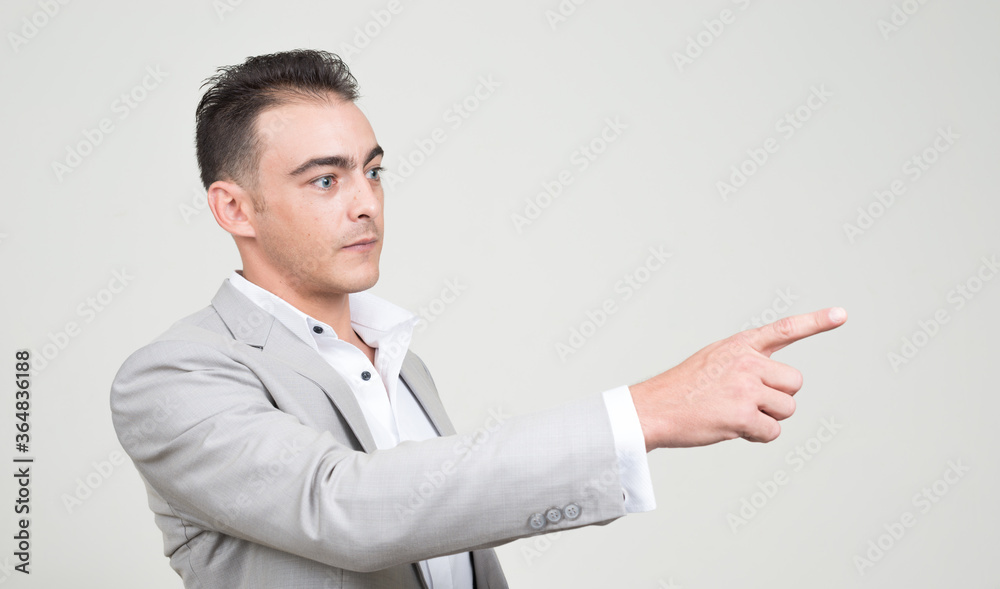 Portrait of young handsome businessman wearing suit Portrait of young handsome businessman wearing suit