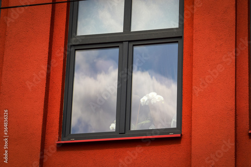 Modern architecture building window with sky reflection