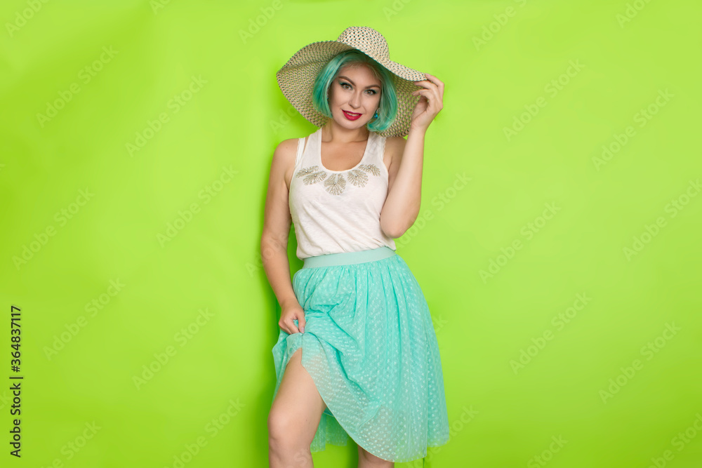 Beautiful young mint haired woman in white top and blue middle skirt wearing white and black hat. Beautiful young mint haired woman in white top and blue middle skirt wearing white and black hat.