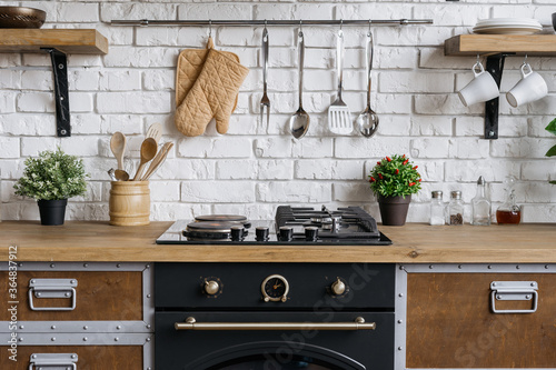 Kitchen with modern interior, furniture and equipment