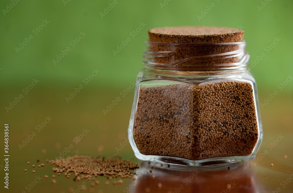 Linseeds in a glass container. Lin seeds Linseeds in a glass container. Lin seeds