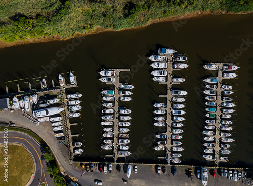 Aerial view of yacht marina in pier speedboat