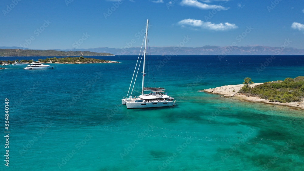 Aerial drone photo of Chinitsa bay a popular anchorage crystal clear turquoise sea bay for yachts and sail boats next to Porto Heli, Saronic gulf, Greece Aerial drone photo of Chinitsa bay a popular anchorage crystal clear turquoise sea bay for yachts and sail boats next to Porto Heli, Saronic gulf, Greece