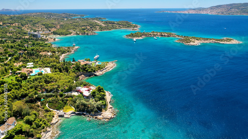 Aerial drone photo of Chinitsa bay a popular anchorage crystal clear turquoise sea bay for yachts and sail boats next to Porto Heli, Saronic gulf, Greece