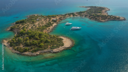 Aerial drone photo of Hinitsa bay a popular anchorage crystal clear turquoise sea bay for yachts and sail boats next to Porto Heli  Saronic gulf  Greece