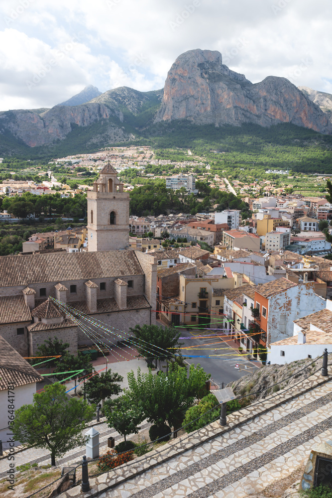 Village of Polop de Marina with church and mountainrange, Costa Blanca, Spain