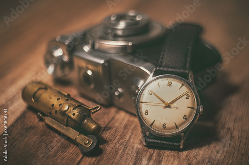 vintage pocket watch, camera nad cigarette lighter
