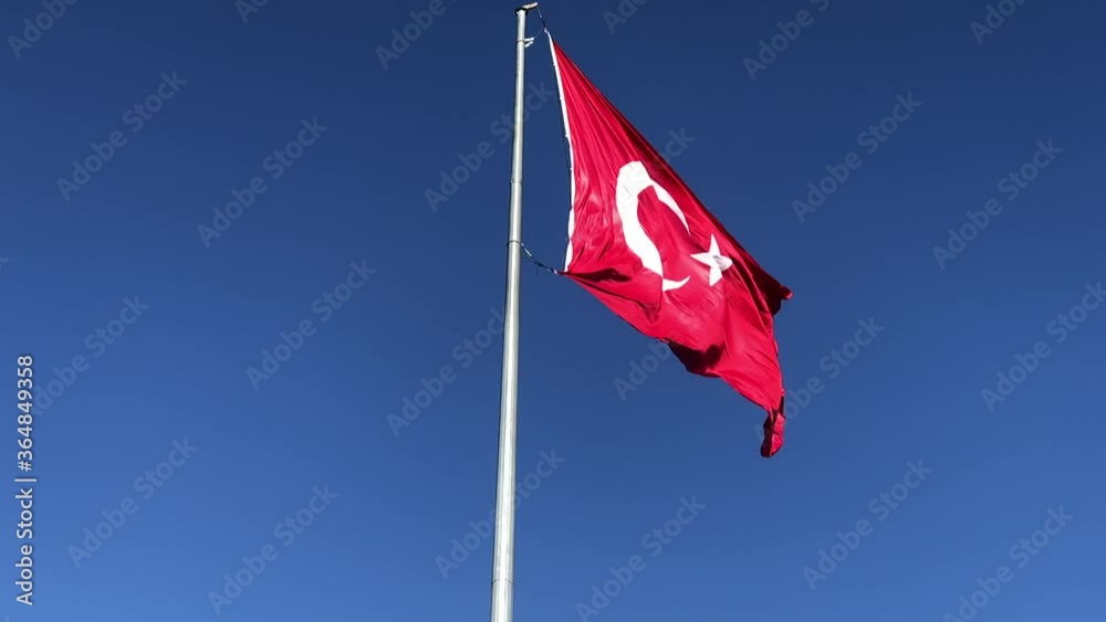 Turkish flag in slow motion at windy and sunny day Turkish flag in slow motion at windy and sunny day