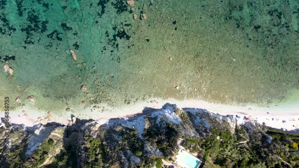 Elba Island, Italy. Amazing downward aerial view from drone of Capo Bianco Beach near Portoferraio Elba Island, Italy. Amazing downward aerial view from drone of Capo Bianco Beach near Portoferraio