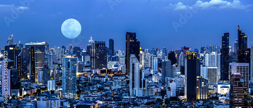Photography night scenery of buildings and skyscrapers in business district of Bangkok