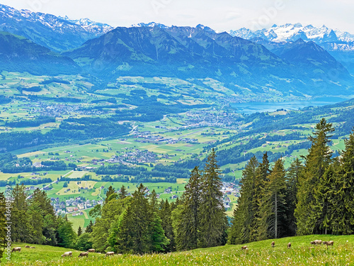 View of the fertile valley with settlemens between the Lakes Alpnachersee and Sarnersee from the Pilatus massif, Alpnach - Canton of Obwalden, Switzerland (Kanton Obwalden, Schweiz) photo