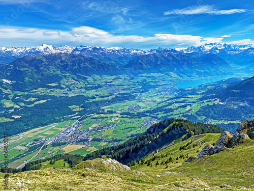 View of the fertile valley with settlemens between the Lakes Alpnachersee and Sarnersee from the Pilatus massif, Alpnach - Canton of Obwalden, Switzerland (Kanton Obwalden, Schweiz) photo