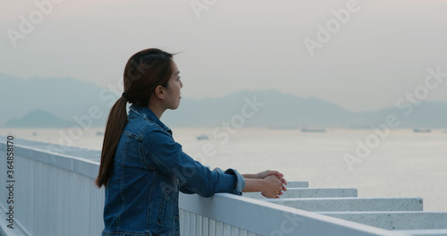 Photography Woman looks at city view