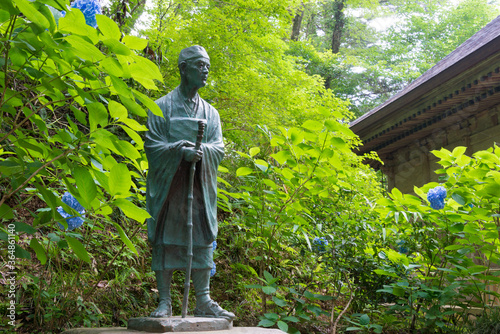 Matsuo Basho Monument at Chusonji Temple in Hiraizumi, Iwate, Japan. Matsuo Basho (1644-1694) was the most famous poet of the Edo period in Japan. photo
